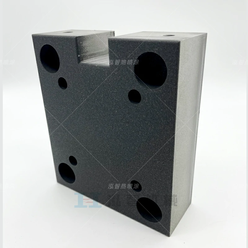 Cell support block with non stick cermet coating