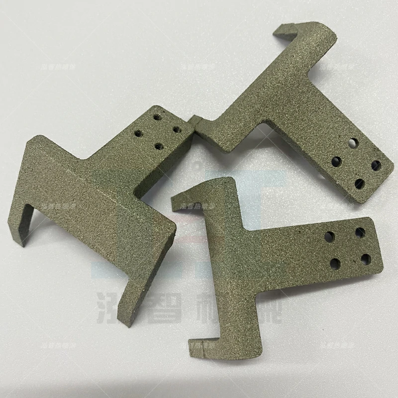 Gripper with non sitck cermet coating